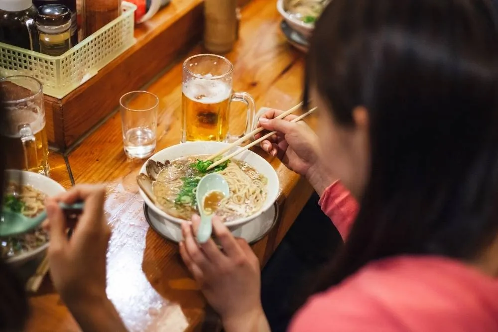 Person eating ramen in Japan — Shutterstock