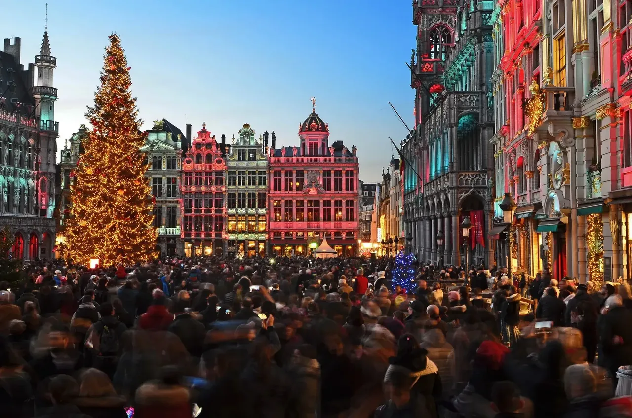 A festive Brussels Christmas Market adorned with sparkling lights and holiday decorations.