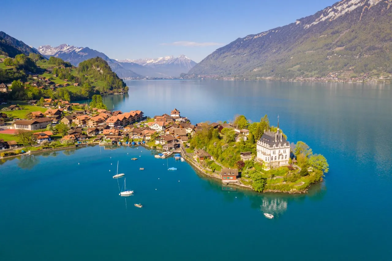 Idyllic view of the Iseltwald village by lake Brienz in Canton Bern in Switzerland