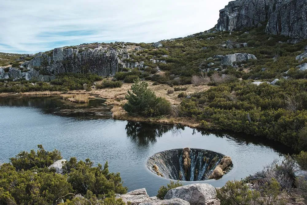 Covão dos Conchos is a waterfall hole in a lake in Serra da Estrela National Park, at Portugal