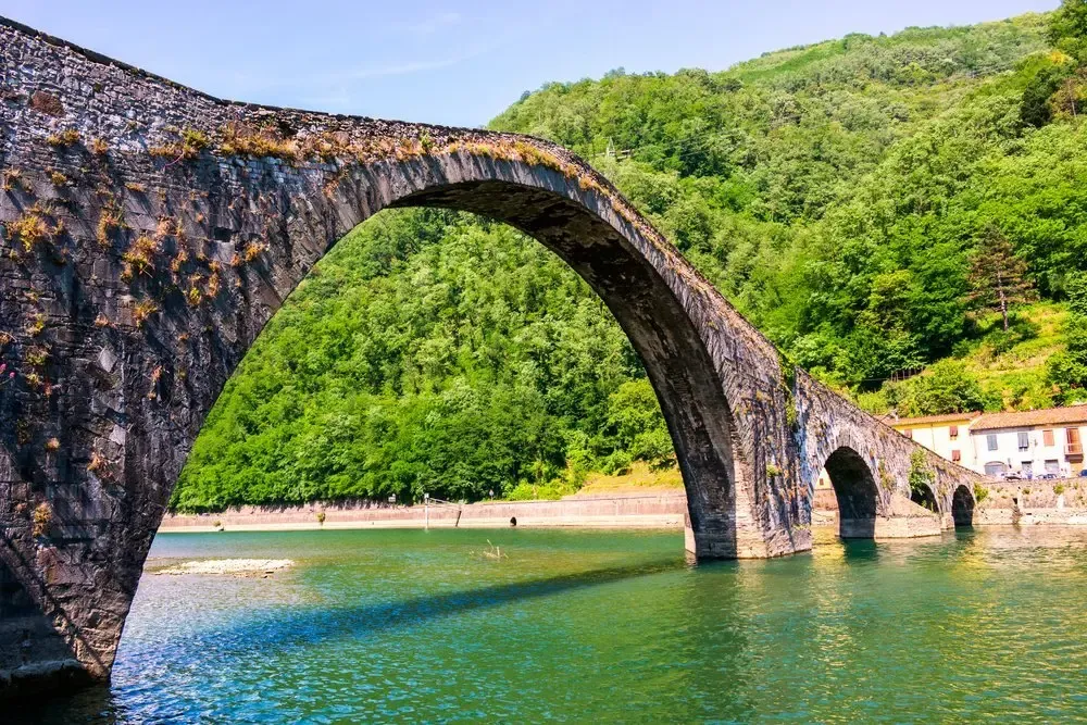 The architect lured a dog onto the bridge with a piece of bread, deceiving the devil — Shutterstock