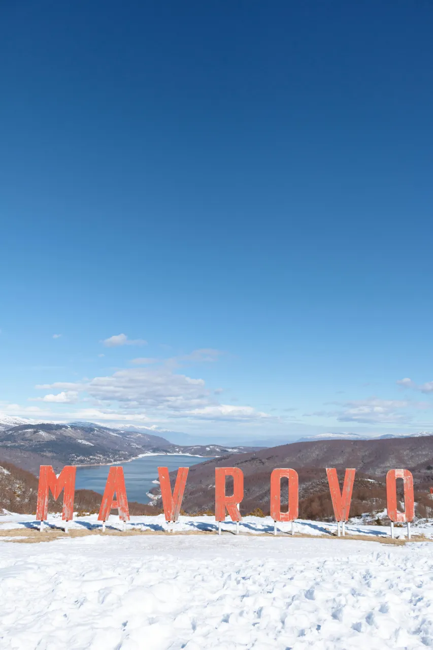 Mavrovo sign with view in Mavrovo National Park