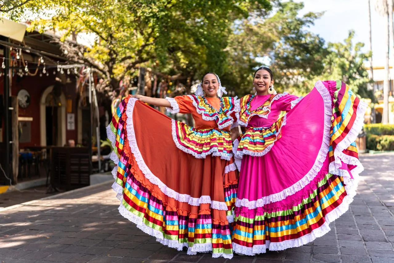 Portrait of women dancers with traditional Mexican clothing outdoors