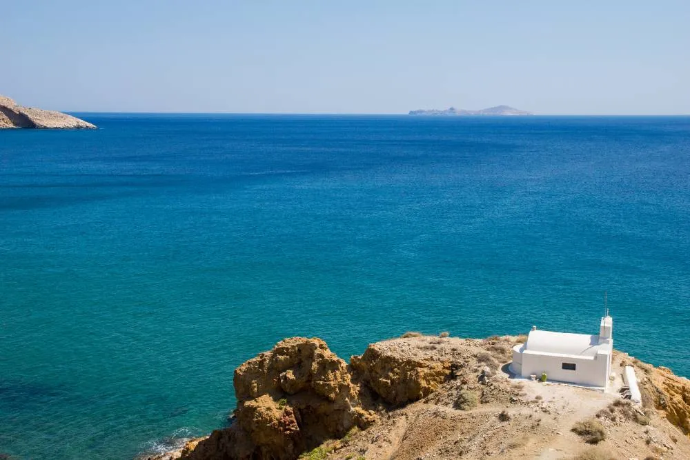 View out to sea from cliffs on Anafi — Getty Images