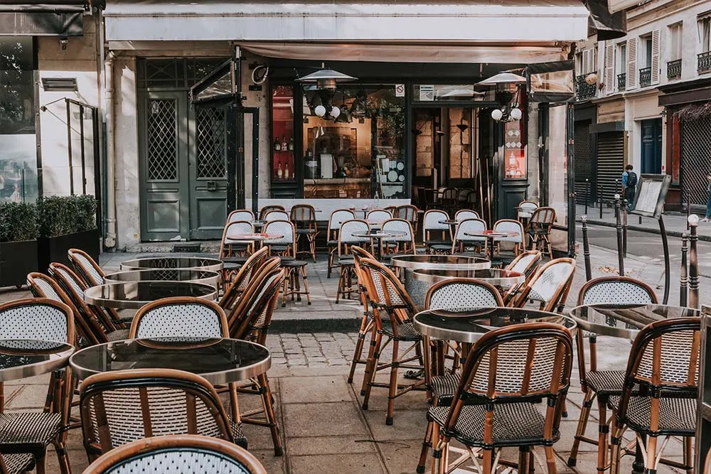 Cafe tables on a street in Paris