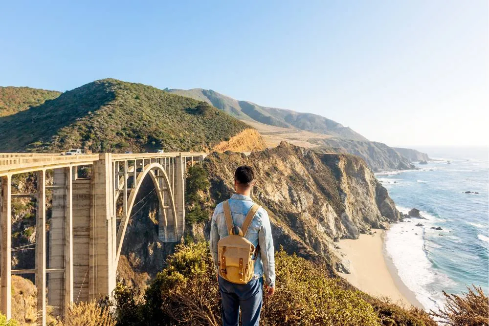 Person looking over Bixby Bridge in Big Sur — Getty Images