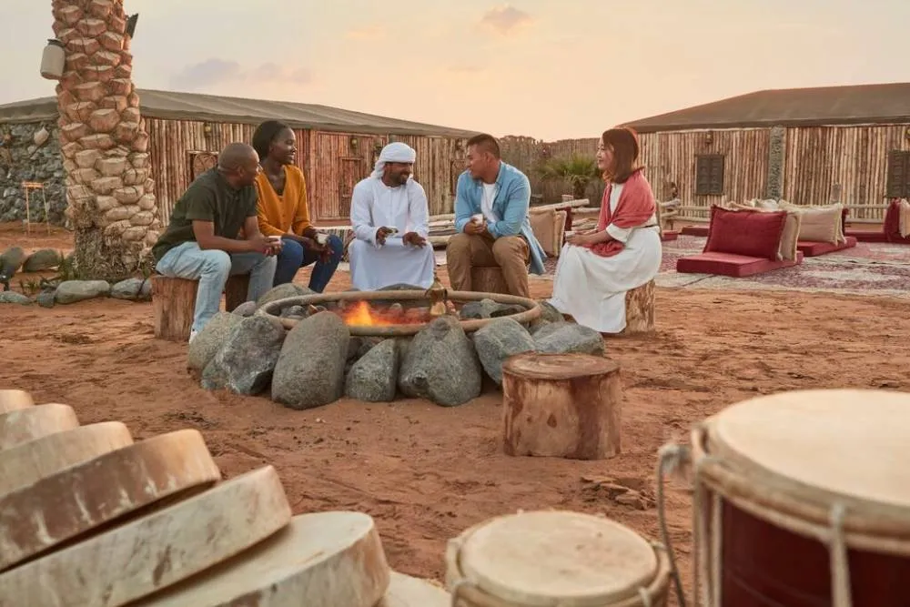 People at desert camp in Dubai — Visit Dubai