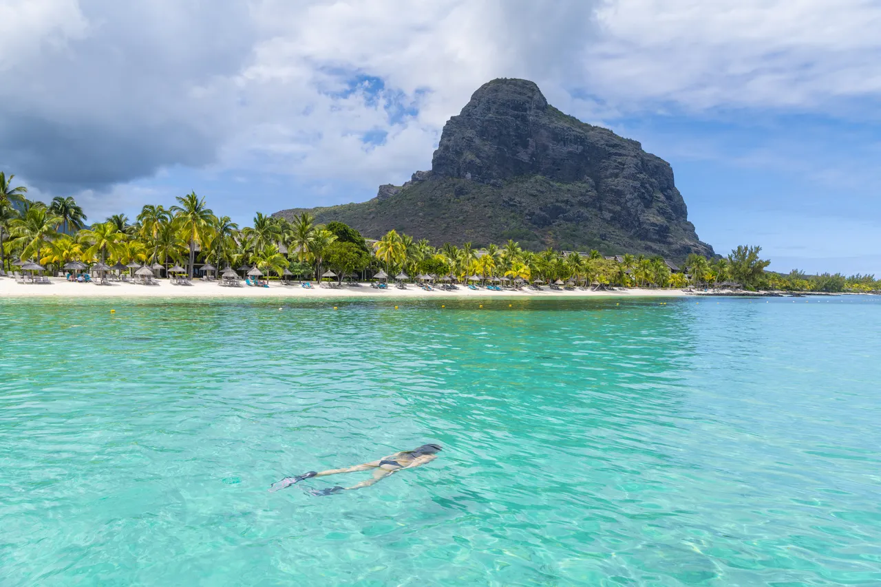 woman swimming in Le Morne, Mauritius