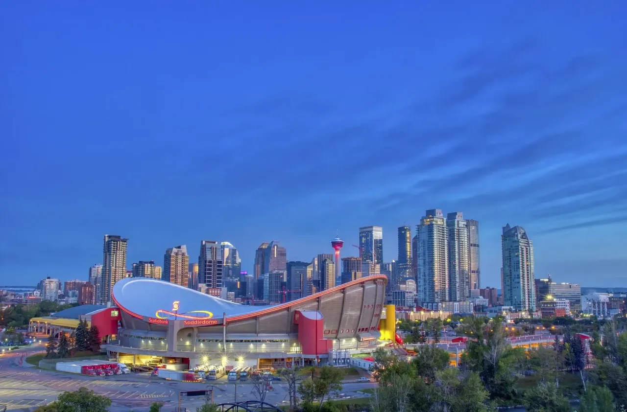 Scenic view from Scotsman’s Hill, overlooking downtown Calgary with the iconic Stampede grounds and city skyline visible in the distance