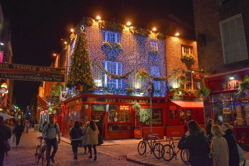 Temple Bar in Dublin at night at Christmas time — Shutterstock