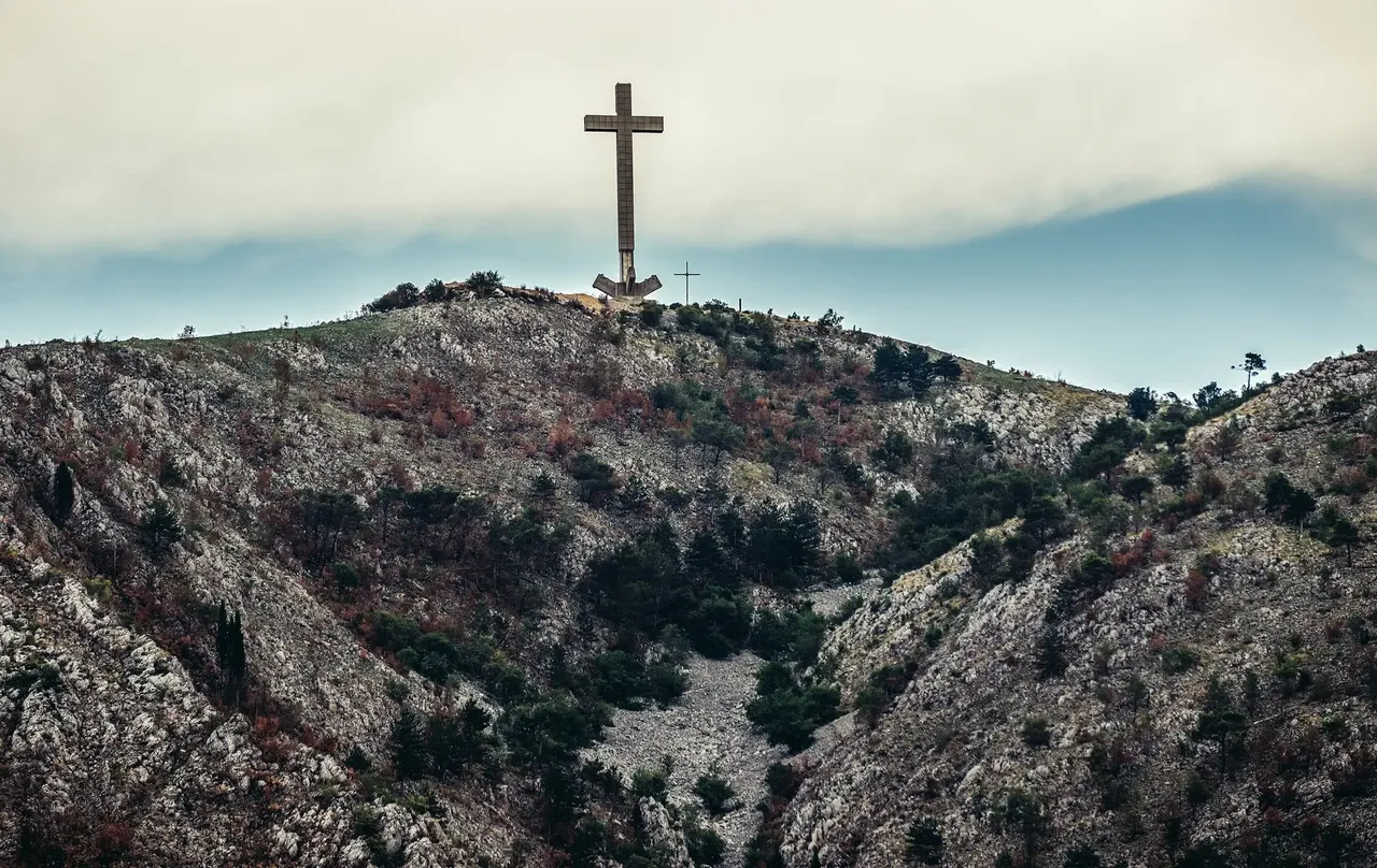 Crowned by a large cross the Hum Hill offers spectacular views of the town — Shutterstock Mostar