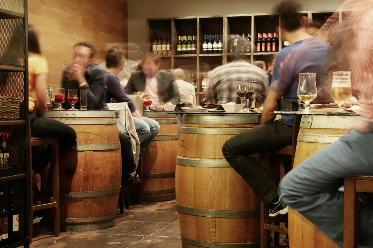 A tapas bar with people enjoying food and drinks