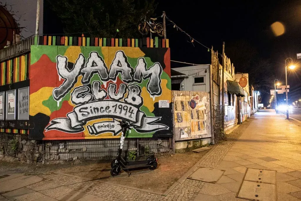 Yaam, a vibrant beach bar and cultural space in Berlin, offering a mix of Caribbean vibes, music, and food along the River Spree