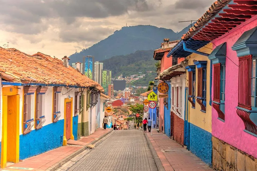 Colourful street with a hilly backdrop in Bogotá