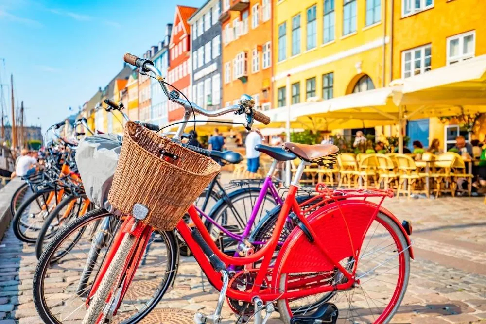 City bikes lined up in Nyhavn in Copenhagen — Shutterstock