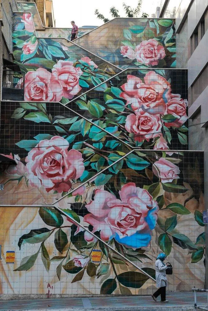 A staircase in Tehran is covered with graffiti of roses – Tommy Nilsson Iran