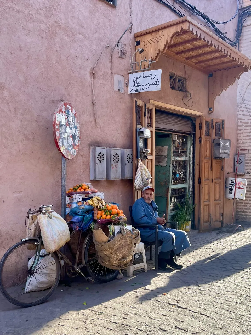 A street vendor selling oranges in the Medina in Morocco