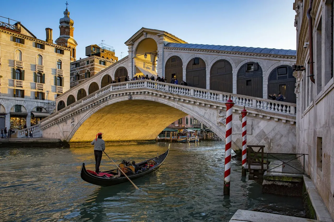 A serene scene of gondolas floating on Venice’s iconic canals