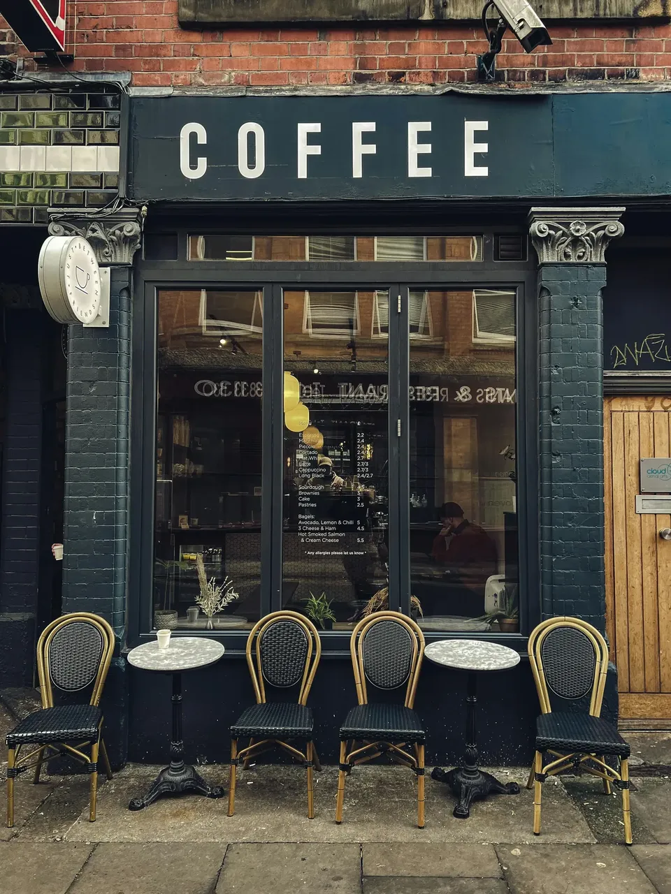 Cozy cafe in the Northern Quarter of Manchester with a welcoming atmosphere and eclectic decor