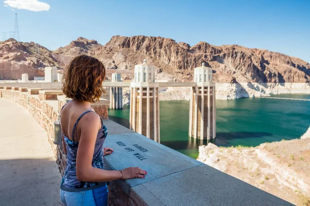 Woman admiring Colorado River from Hoover Dam — Getty Images