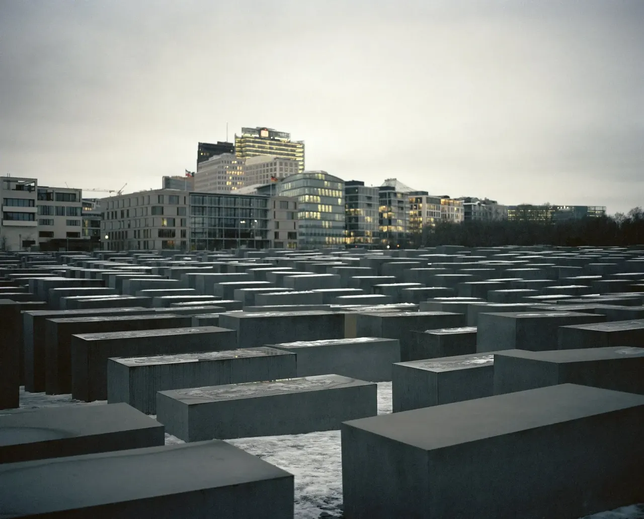 The Holocaust Memorial in Berlin, consisting of a field of gray concrete slabs of varying heights, honoring the Jewish victims