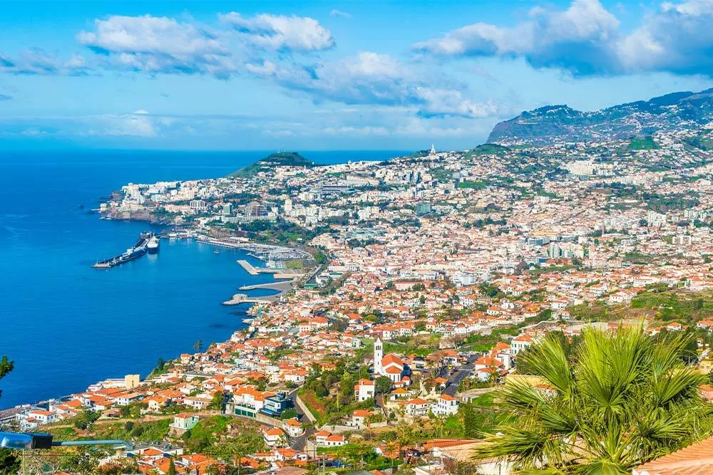 Panoramic sunny view of Funchal — Shutterstock
