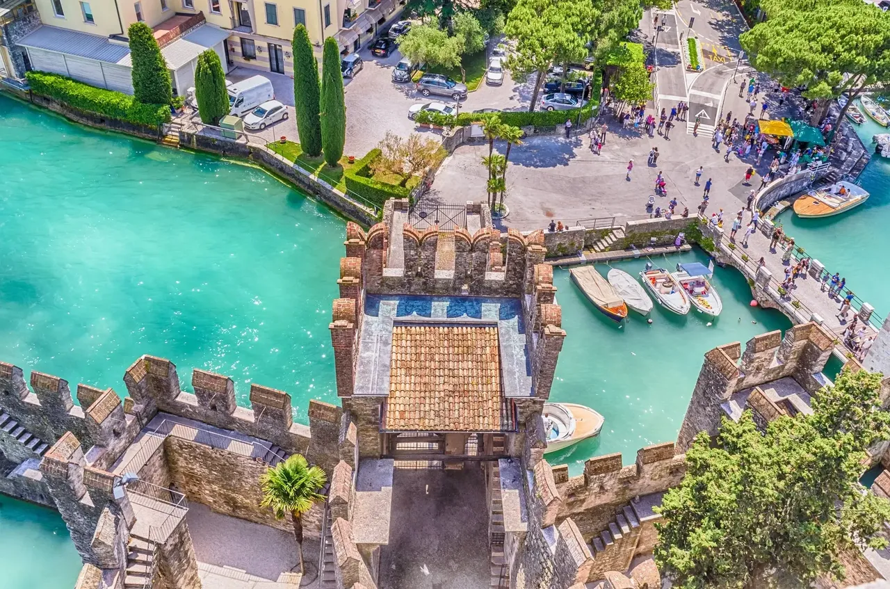 The Scaliger Castle in Sirmione, Italy — Marco Rubino / Shutterstock 7 European lakeside holidays for 2019 lake beach