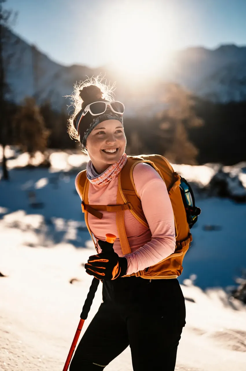 Woman walking in the snow — Shutterstock