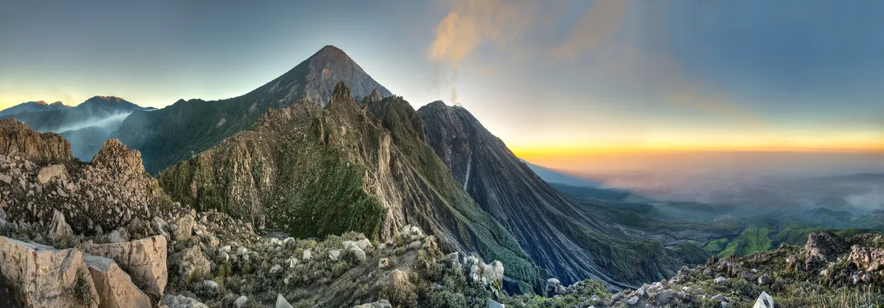 the sun is about to rise at Santa Maria Volcano