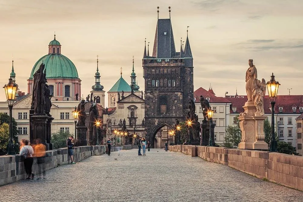 Historic Charles Bridge in Prague, Czech Republic is a popular hangout for locals and tourists alike