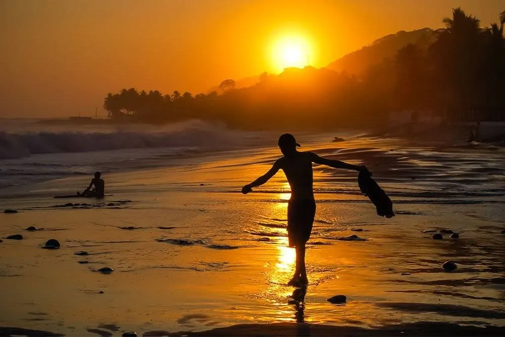 The sun sets over El Salvador’s coastline