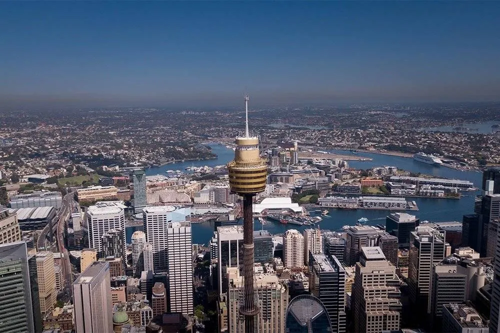 Above view of Sydney’s high-rise building, with Sydney Tower in the foreground — Shutterstock