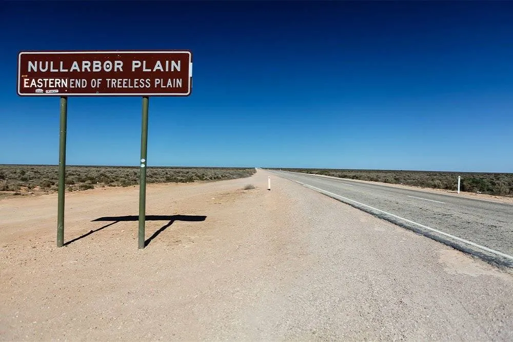 Sign against blue sky marking Nullabor Plain — Shutterstock