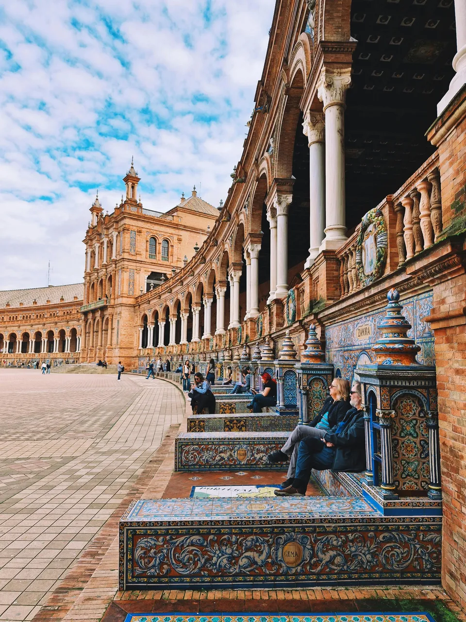 Plaza de España with people sitting on the tiles