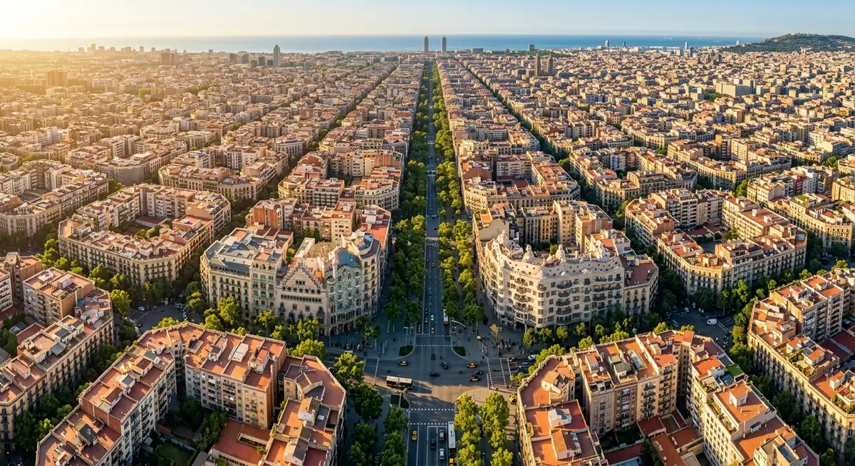 The grid of Eixample seen from above, with Passeig de Gràcia running through the centre and Sagrada Família in the distance
