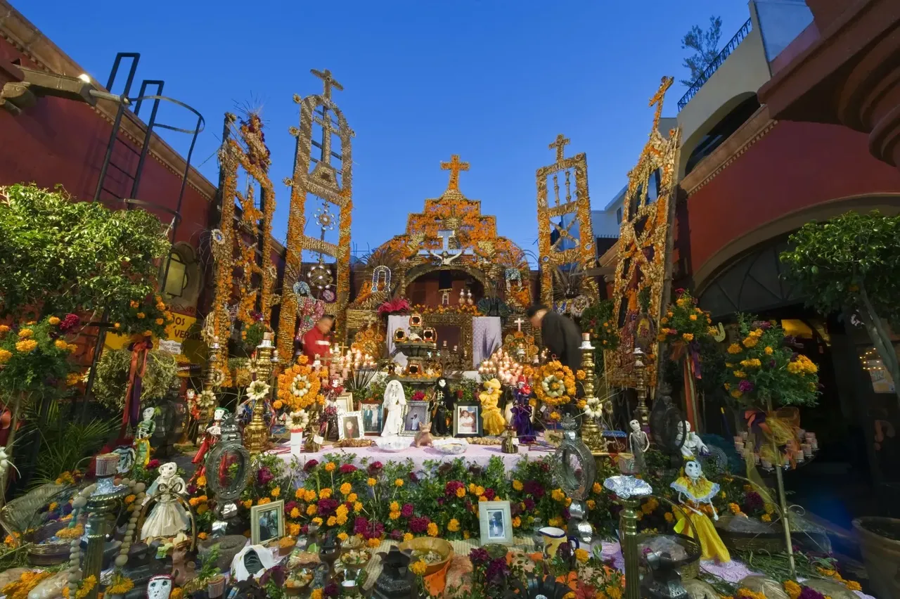 Vibrant marigolds and offerings honor the spirits during Oaxaca’s Day of the Dead celebrations, a time of remembrance and tradition