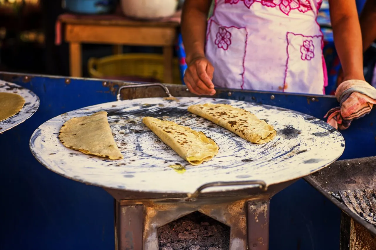 Mexican Quesadillas being made in a comal