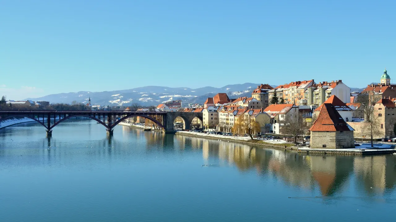 Sitting on the banks of the Drava River, Maribor’s town centre is mostly stately 15th century buildings — Wikimedia Commons cool budget european Palermo Paphos