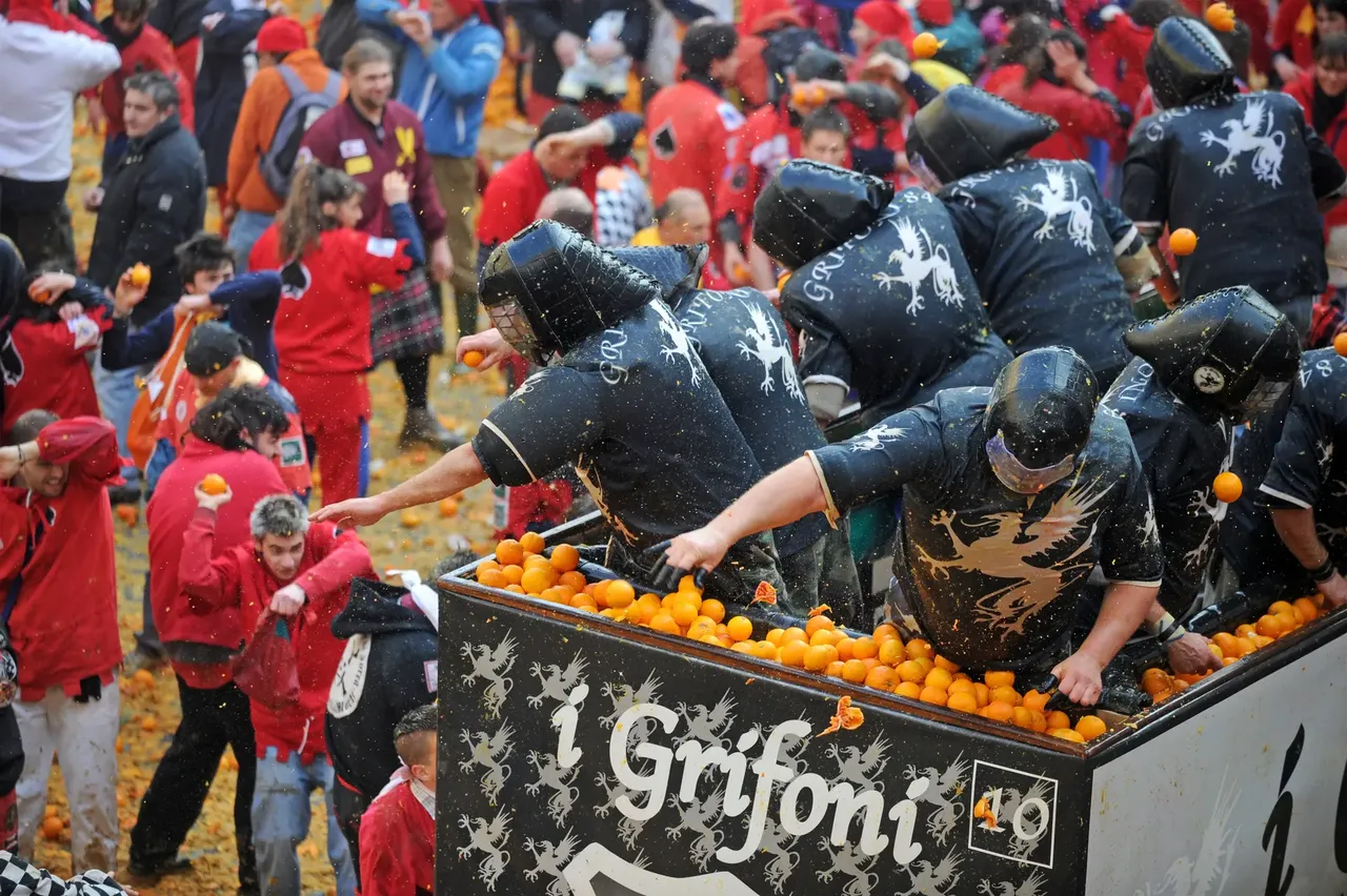 Townspeople reenact the storming of a palace with oranges instead of actual weapons — Paolo Bona / Shutterstock The 6 best places to travel in March 2019