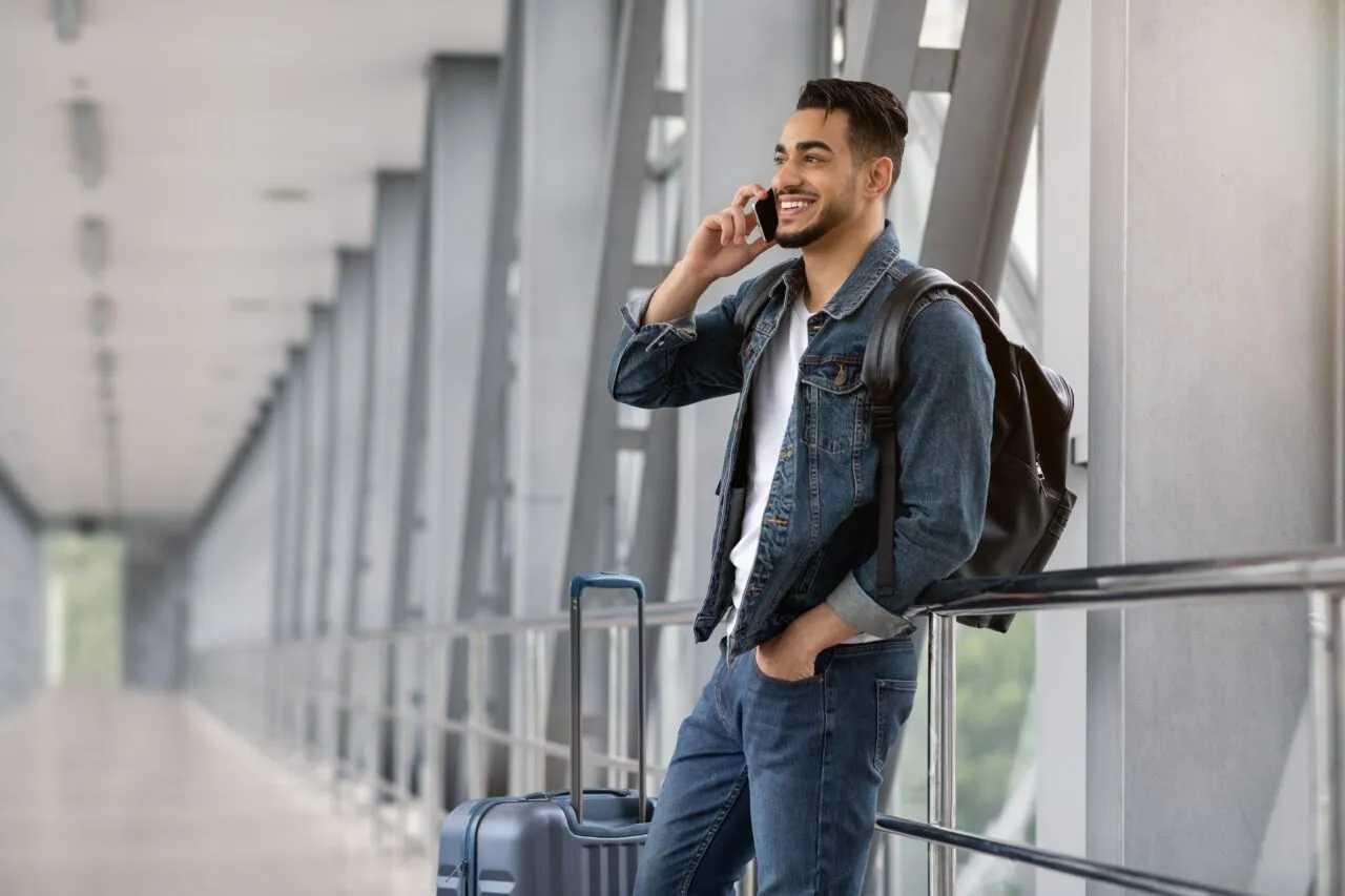 Roaming,Abroad.,Portrait,Of,Handsome,Arab,Man,Talking,On,Cellphone