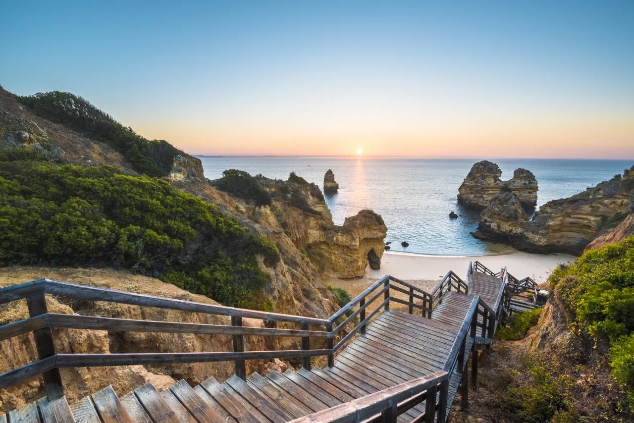 Walkway to idyllic beach, Algarve, Portugal