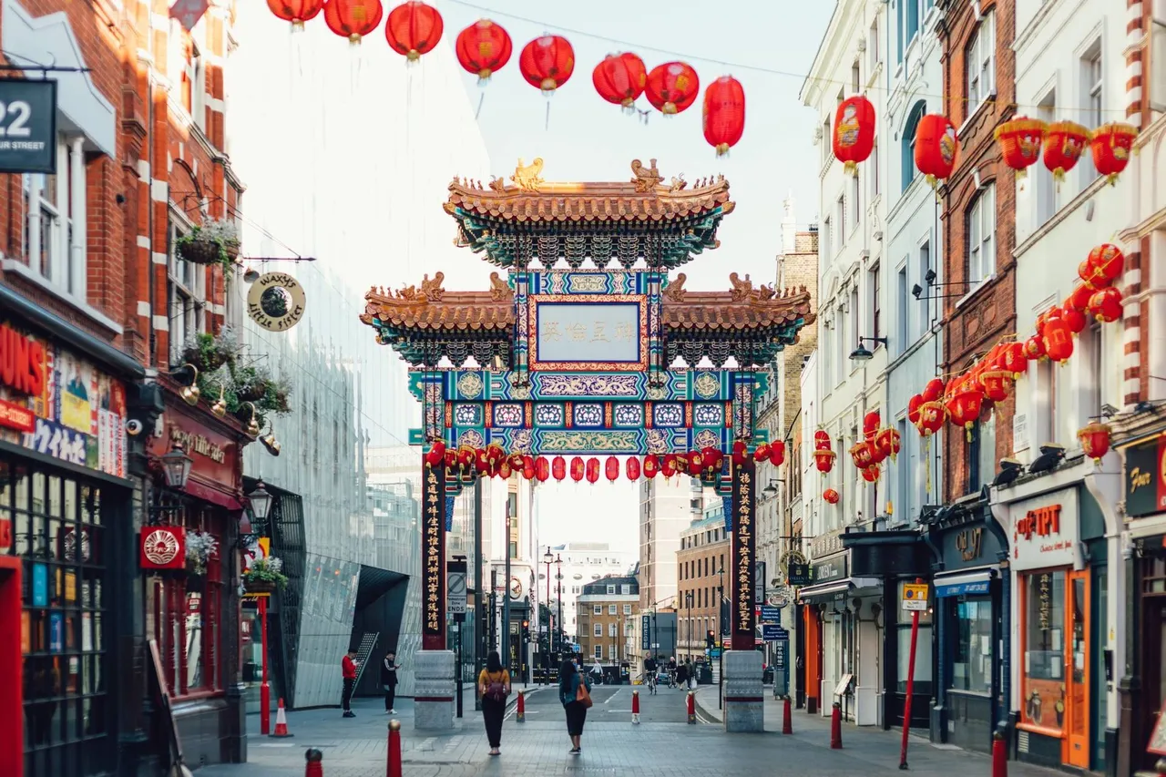 A traditional Chinese style pavilion located in Chinatown, London - with red coloured lantern hanging in the sky
