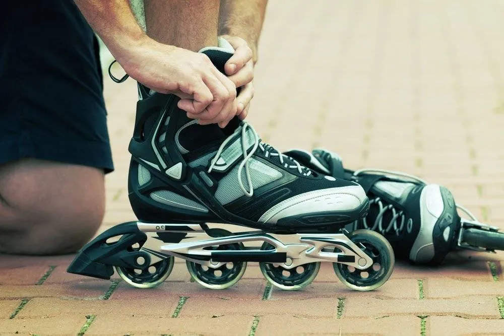 A person’s foot in a rollerblade — Shutterstock