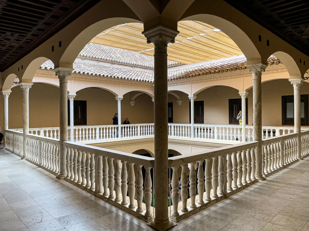 The elegant veranda of the Picasso Museum in Malaga, offering a quiet space with historical charm.