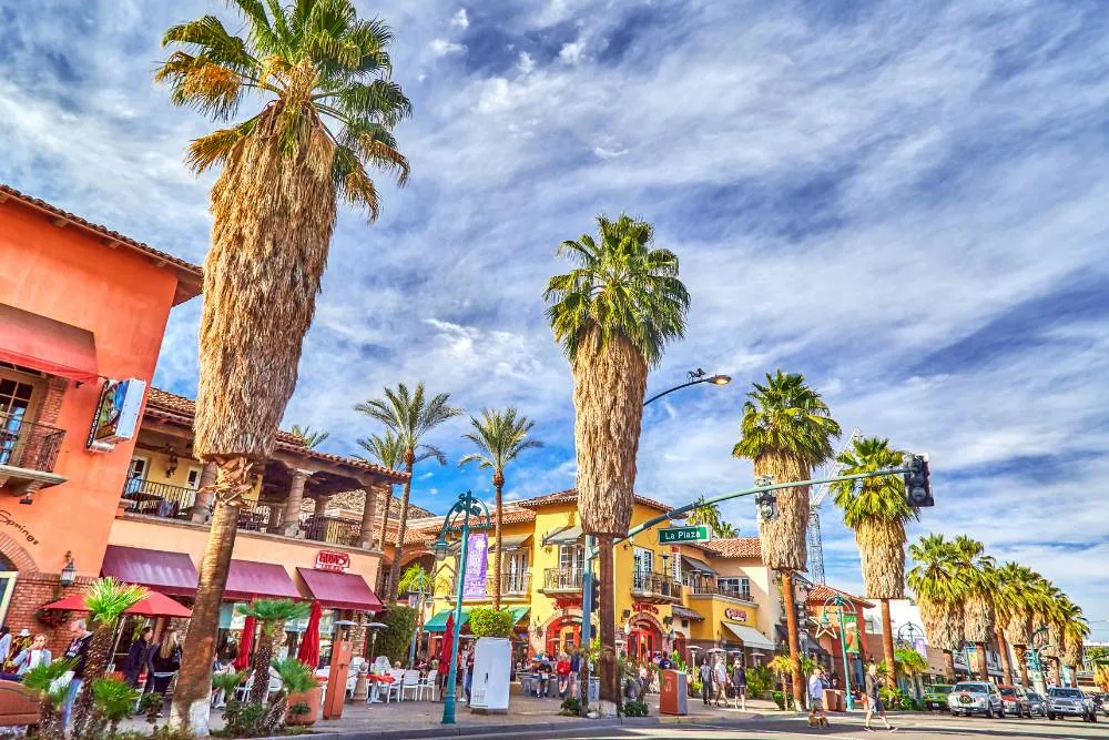 Palm trees and main street of Palm Springs — Getty Images