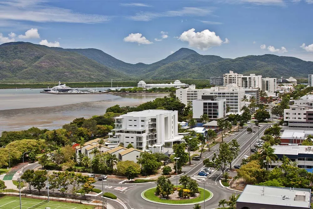 Cairns from above with mountains in the background — Shutterstock